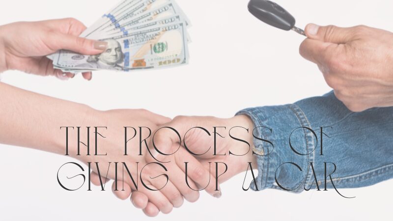 車の鍵とお金を交換して握手する